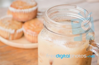 Banana Muffins And Iced Coffee Stock Photo