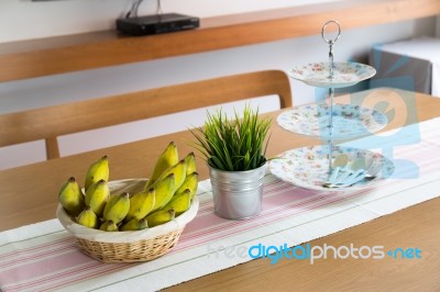 Banana On Wooden Table Stock Photo