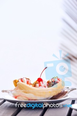 Banana Split Ice Cream With Whipped Cream And Cherry Stock Photo