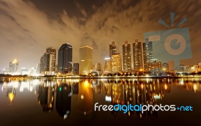 Bangkok In Evening, Reflection Of Buildings In Water Stock Photo