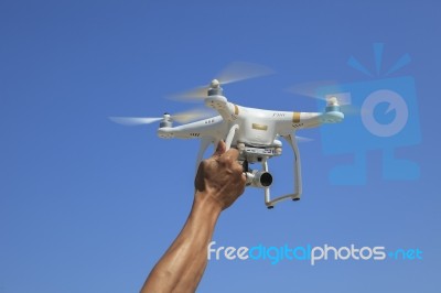 Bangkok Thailand - March 13: Dji Phantom Drone Hover Flying With Camera Recoard Lens Against Blue Sky ,aerial Photography By Drone Is Very Popular In Present On March 13 ,201in Bangkok Thailand Stock Photo