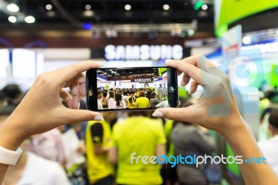 Bangkok Thailand - October 03: Hand Use Smartphone Capture Crowd In Thailand Mobile Expo Event On October 03, 2015 Stock Photo