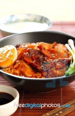 Barbecue Pork With Gravy On Rice Stock Photo