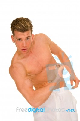 Bare Chested Man Showing Muscles Stock Photo