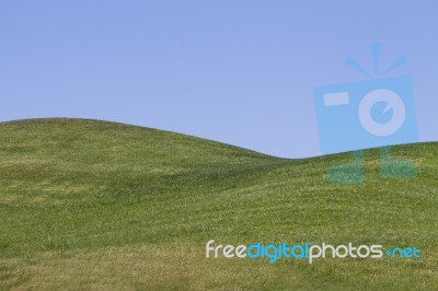 Bare Green Hills Stock Photo