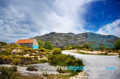 Barn In Mountains Stock Photo