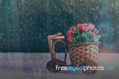 Basket Of Roses On Wooden Stock Photo