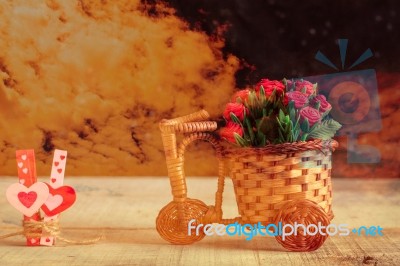 Basket Of Roses With The Sky Stock Photo