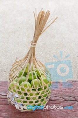 Basket With Monkey Apple Stock Photo