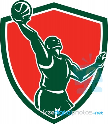 Basketball Player Rebounding Lay-up Ball Shield Stock Image