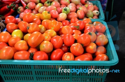 Baskets Of Tomatoes For Sale Stock Photo