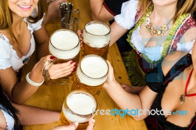 Bavarian Girls Drinking Beer Stock Photo