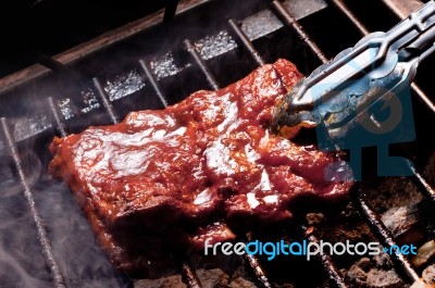 BBQ Ribs On Grill  Stock Photo