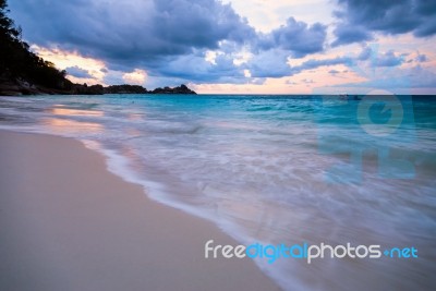 Beach And Sea Sunset At Koh Miang Thailand Stock Photo