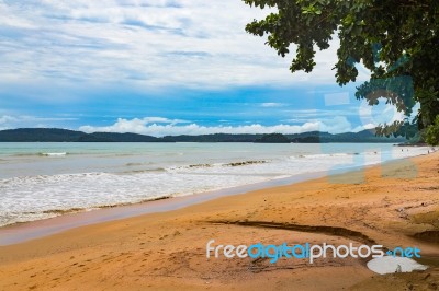 Beach In Thailand With A Dark Sky In The Background Stock Photo