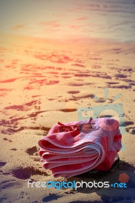 Beach Towel On Sand Stock Photo