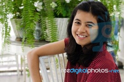 Beautiful Asian Girl At Vintage Home Stock Photo