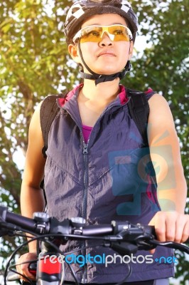 Beautiful Asian Girl With Mountain Bike Stock Photo