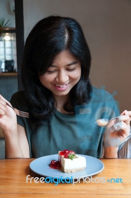 Beautiful Asian Woman Prepare To Eating A Cake In Cafe Stock Photo