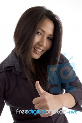 Beautiful Asian Woman Showing Thumbs Up Stock Photo