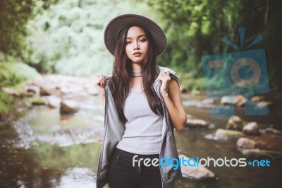 Beautiful Asian Woman Smiling Around The Nature Green And Water Stock Photo