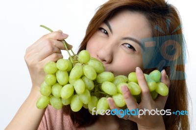 Beautiful Asian Woman With Grape Stock Photo