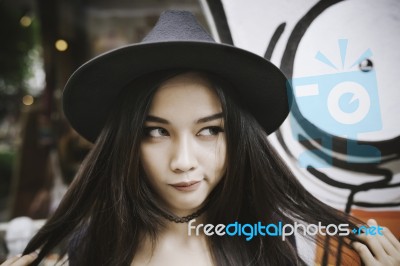 Beautiful Asian Young Woman Smiling On The City Stock Photo