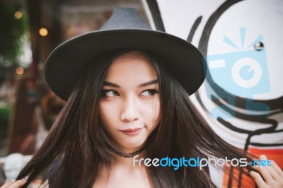 Beautiful Asian Young Woman Smiling On The City Stock Photo