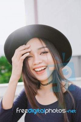 Beautiful Asian Young Woman Smiling On The City Stock Photo