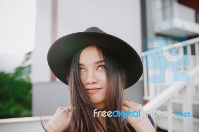 Beautiful Asian Young Woman Smiling On The City Stock Photo