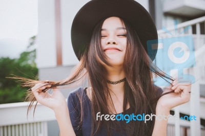 Beautiful Asian Young Woman Smiling On The City Stock Photo