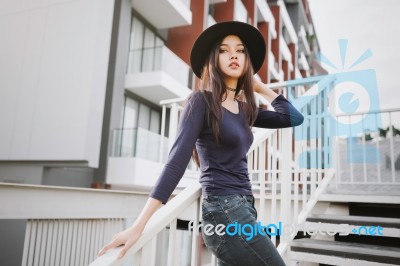 Beautiful Asian Young Woman Smiling On The City Stock Photo