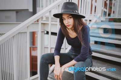 Beautiful Asian Young Woman Smiling On The City Stock Photo