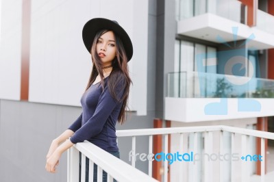 Beautiful Asian Young Woman Smiling On The City Stock Photo