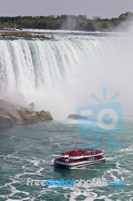 Beautiful Background With A Ship And Amazing Niagara Waterfall Stock Photo