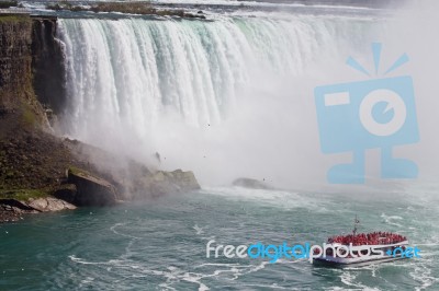 Beautiful Background With A Ship And Amazing Niagara Waterfall Stock Photo