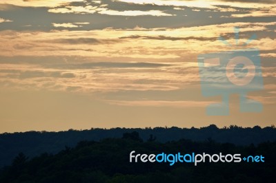 Beautiful Background With A Sunset And The Forest Stock Photo