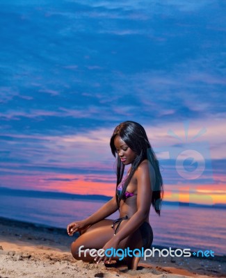 Beautiful Black African American Woman Posing On The Beach At Su… Stock Photo