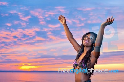 Beautiful Black African American Woman Posing On The Beach At Su… Stock Photo