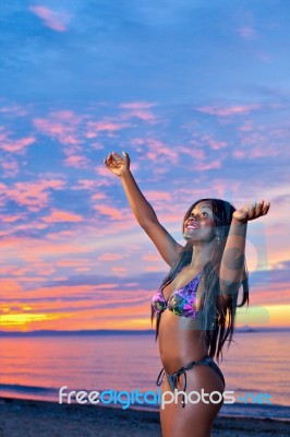 Beautiful Black African American Woman Posing On The Beach At Su… Stock Photo