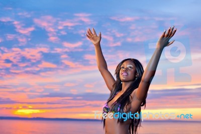 Beautiful Black African American Woman Posing On The Beach At Su… Stock Photo