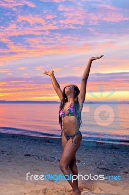 Beautiful Black African American Woman Posing On The Beach At Su… Stock Photo