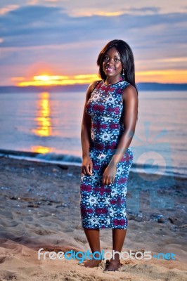 Beautiful Black African American Woman Posing On The Beach At Su… Stock Photo