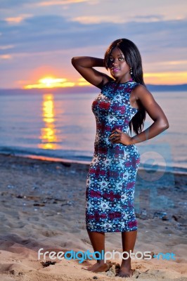 Beautiful Black African American Woman Posing On The Beach At Su… Stock Photo