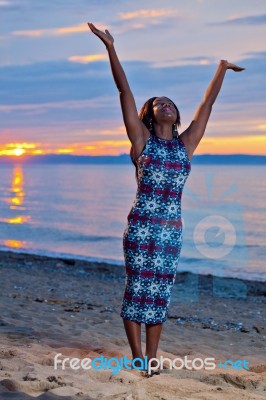 Beautiful Black African American Woman Posing On The Beach At Su… Stock Photo