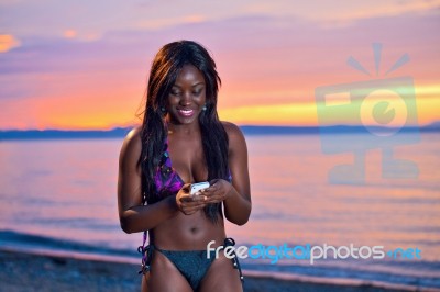 Beautiful Black African American Woman Posing On The Beach At Su… Stock Photo