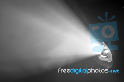 Beautiful Black And White Color Wide Lens Projector With Light Beam For Movie And Cinema At Night . Smoke Texture Spotlight . Screening For Multimedia . Abstract Background  Stock Photo