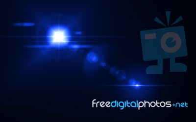 Beautiful Blue Digital Lens Flare In Black Background Horizontal Frame Stock Image