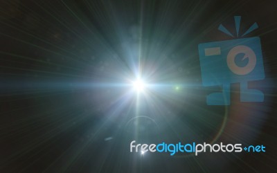 Beautiful Blue Digital Lens Flare In Black Background Horizontal Frame Stock Image