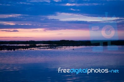 Beautiful Blue Sky Sunset At Lotus Lake Stock Photo